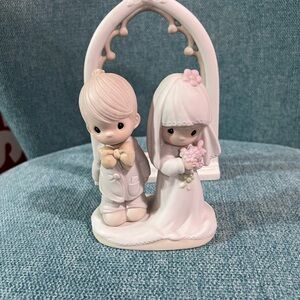 Precious Moments wedding cake topper/ Figurine and wedding arch